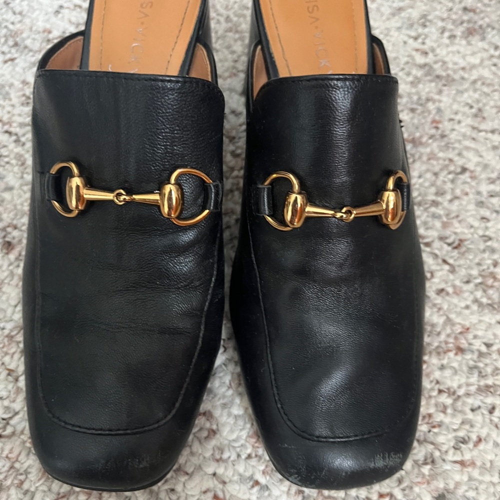 Black Leather Loafers with Gold Detailing